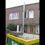 33-oud-vervuild-grind-van-dak-af-via-provisorische-stortpijp